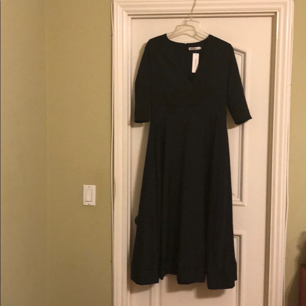 Black 3/4 sleeve V neck mid calf dress. NWT.
